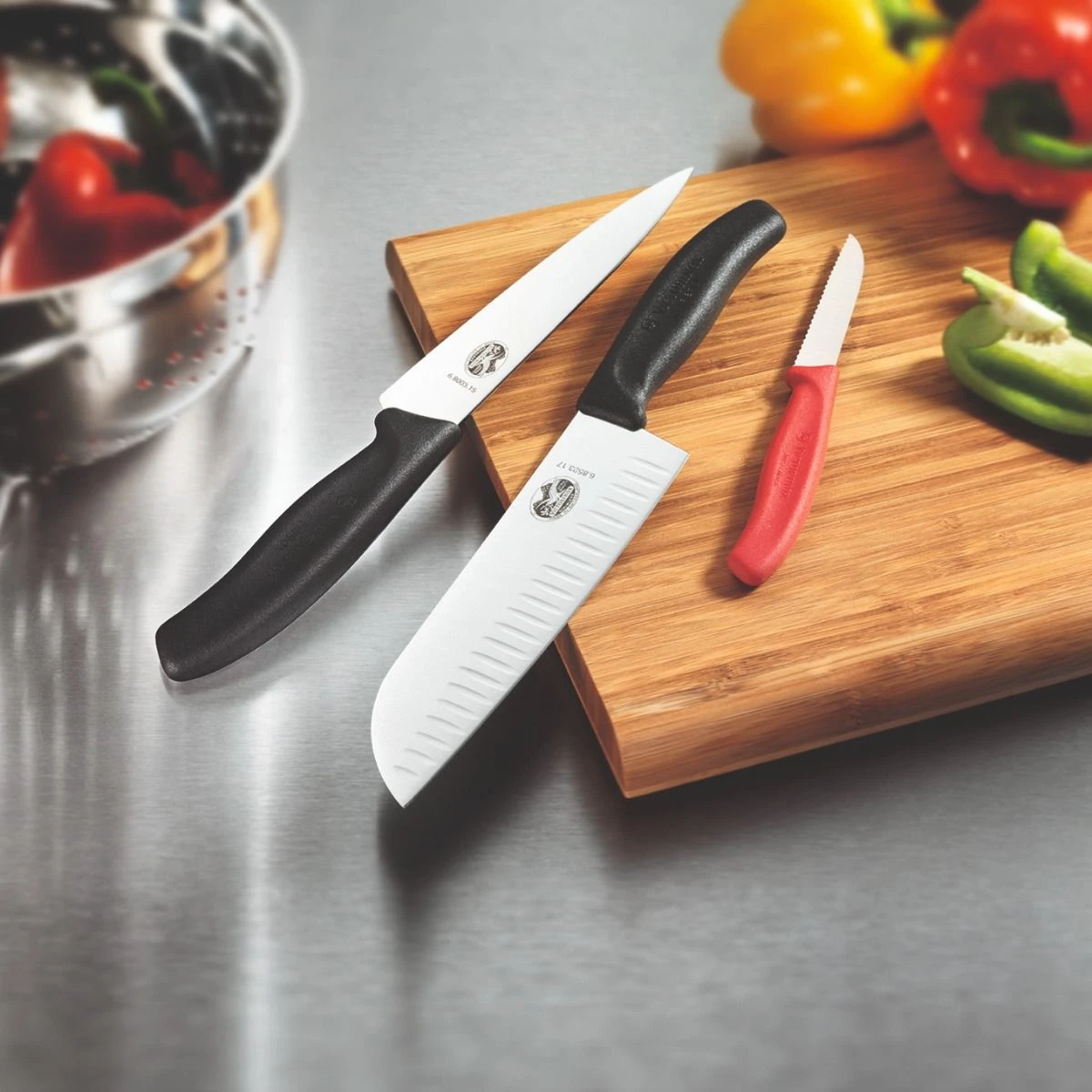 Victorinox Swiss Classic 17cm Santoku Knife Fluted Blade Yellow (6852617L8B) - Image 5